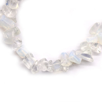 Alt Tag: Opalite Chipstone Bracelet – Natural Stone, translucent white opalite chip beads bracelet close-up on white background