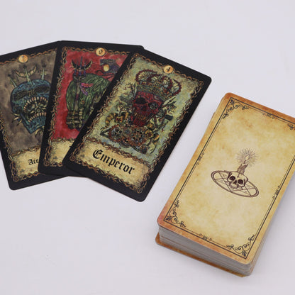 Alt Tag: Paper Tarot Cards – Requiem Arcana Set gothic tarot deck with illustrated Emperor card and stacked paper cards on white background