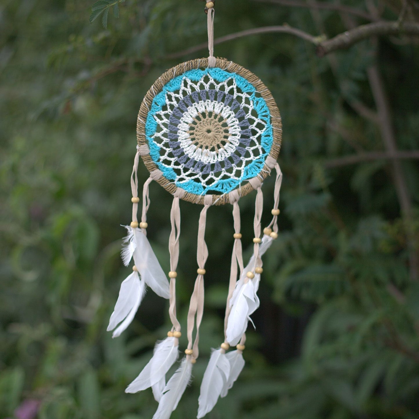 Alt Tag: Pastel Blue Cotton Dream Catcher – 16CM handcrafted cotton dream catcher with crochet web, feathers and beads, hanging decor