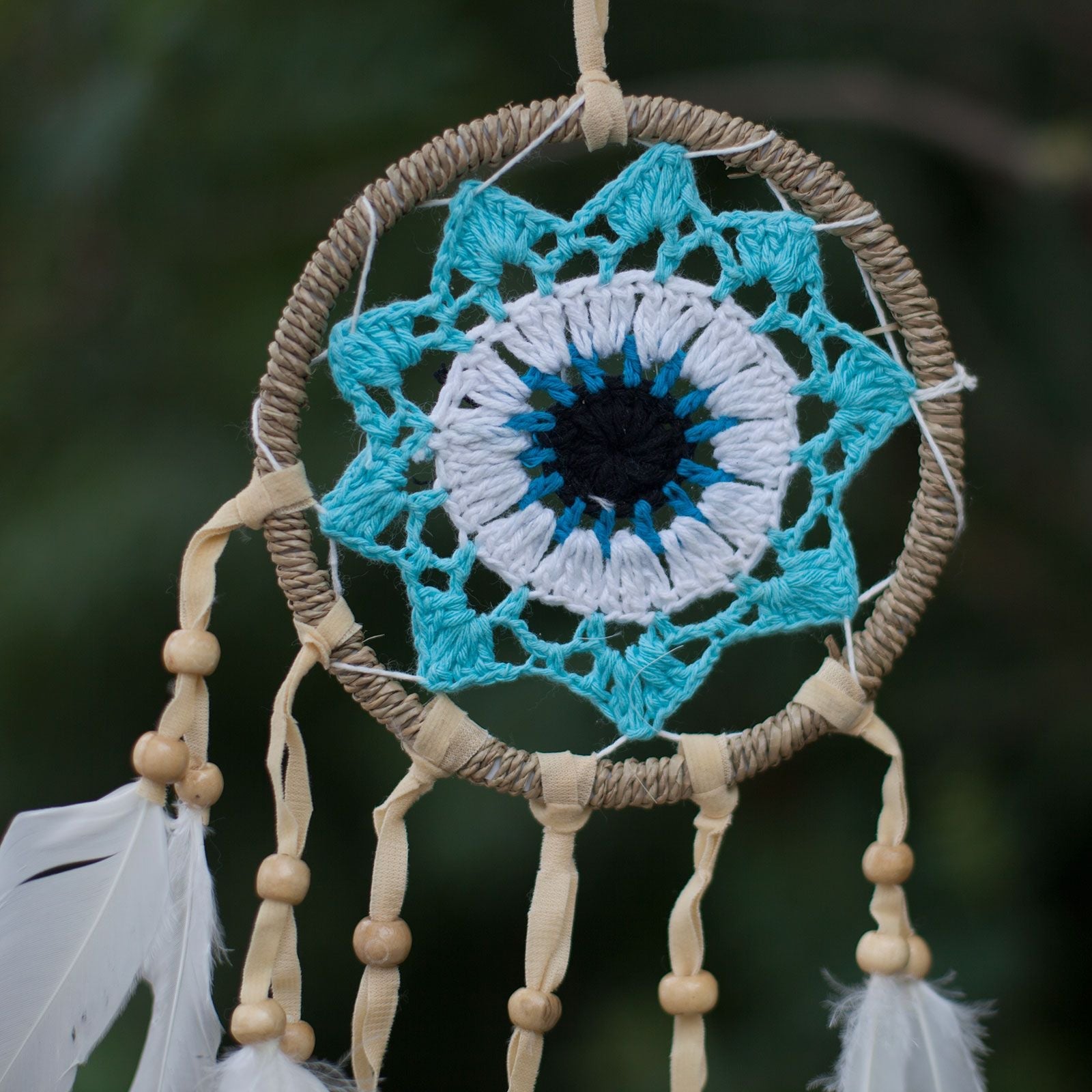 Pastel Blue Macramé Dream Catcher – 12CM with handwoven cotton ring, blue and white crochet center, beads and white feathers