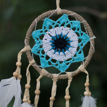 Pastel Blue Macramé Dream Catcher – 12CM with handwoven cotton ring, blue and white crochet center, beads and white feathers
