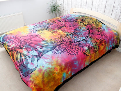 Peaceful Buddha Cotton Bedspread – 230x200 CM on bed with colorful tie-dye background and detailed Buddha mandala design