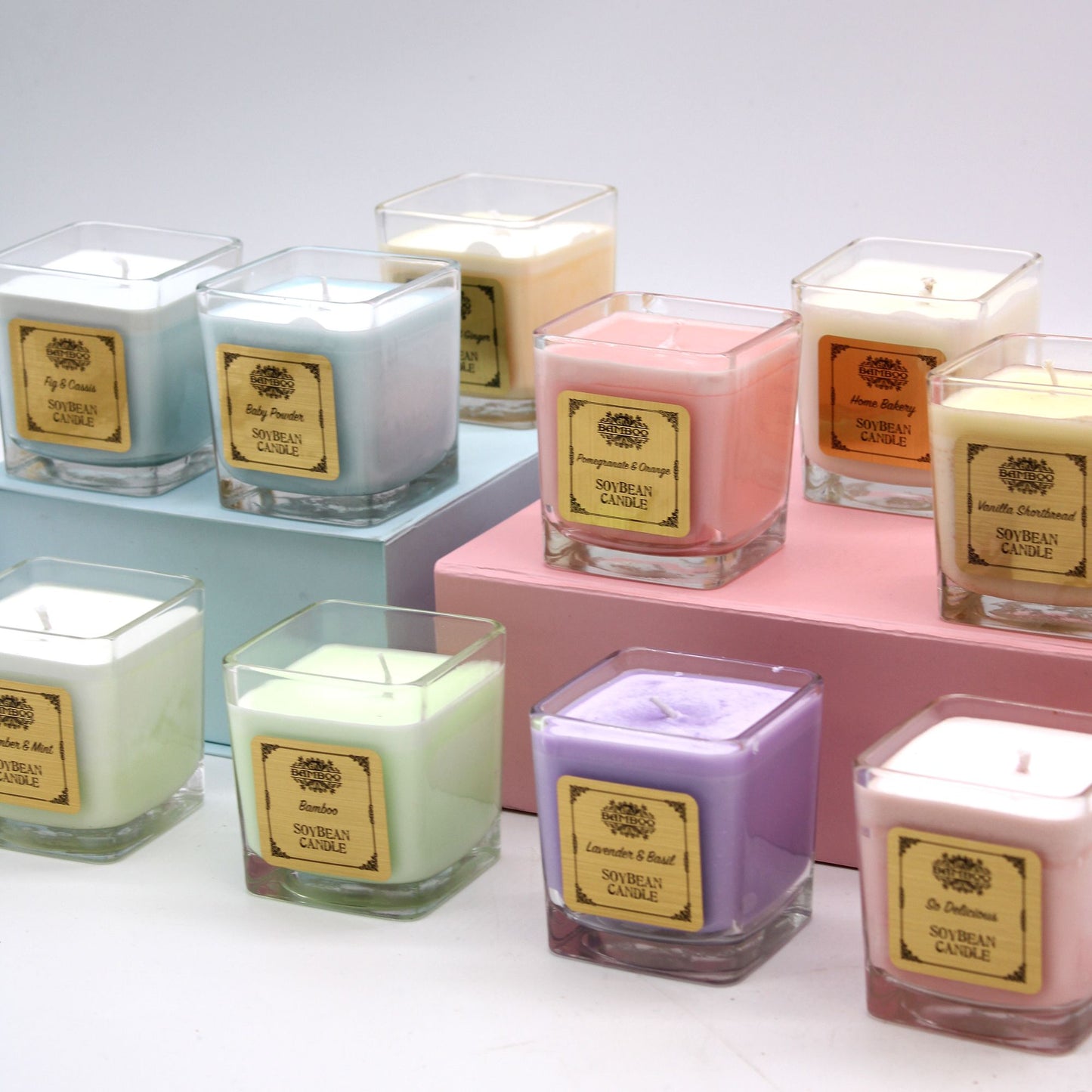 Peach Smoothie Soy Wax Candle – 200G displayed in recycled glass jar with peach-colored soy wax among assorted scented candles