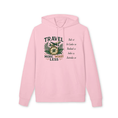 Alt Tag: Personalized Travel Your Destinations 100% Organic Cotton Hoodie in pink with “Travel more worry less” graphic and destination list