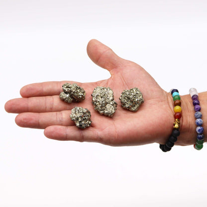 Alt Tag: Peruvian Pyrite – Medium Rare Gemstone, 200G in hand, four golden pyrite mineral clusters, approx 35-50mm specimens