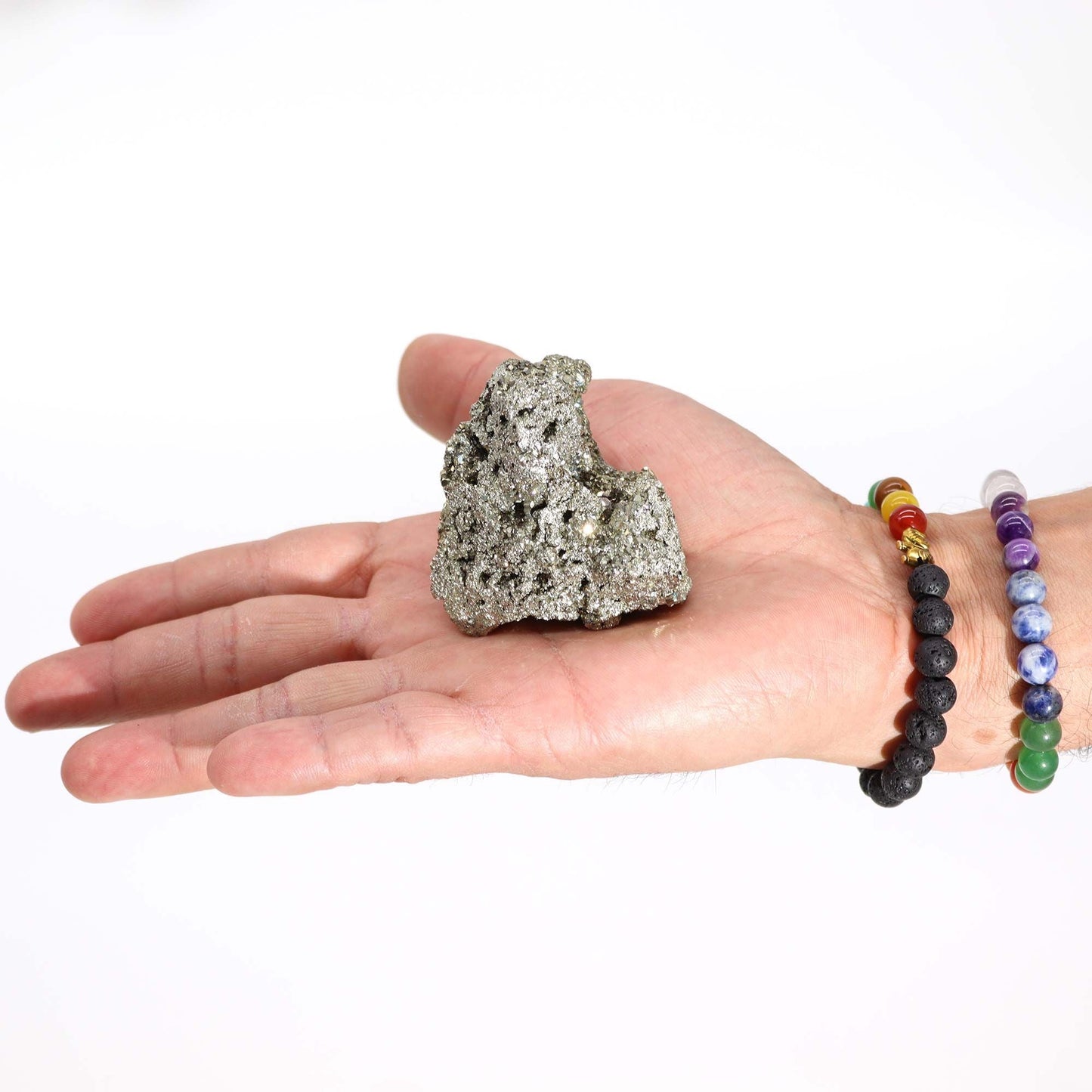 Alt Tag: Gemstone Rare Mineral Specimens – 100-135G 55-65MM Peruvian pyrite specimen held in hand, natural metallic crystal mineral rock