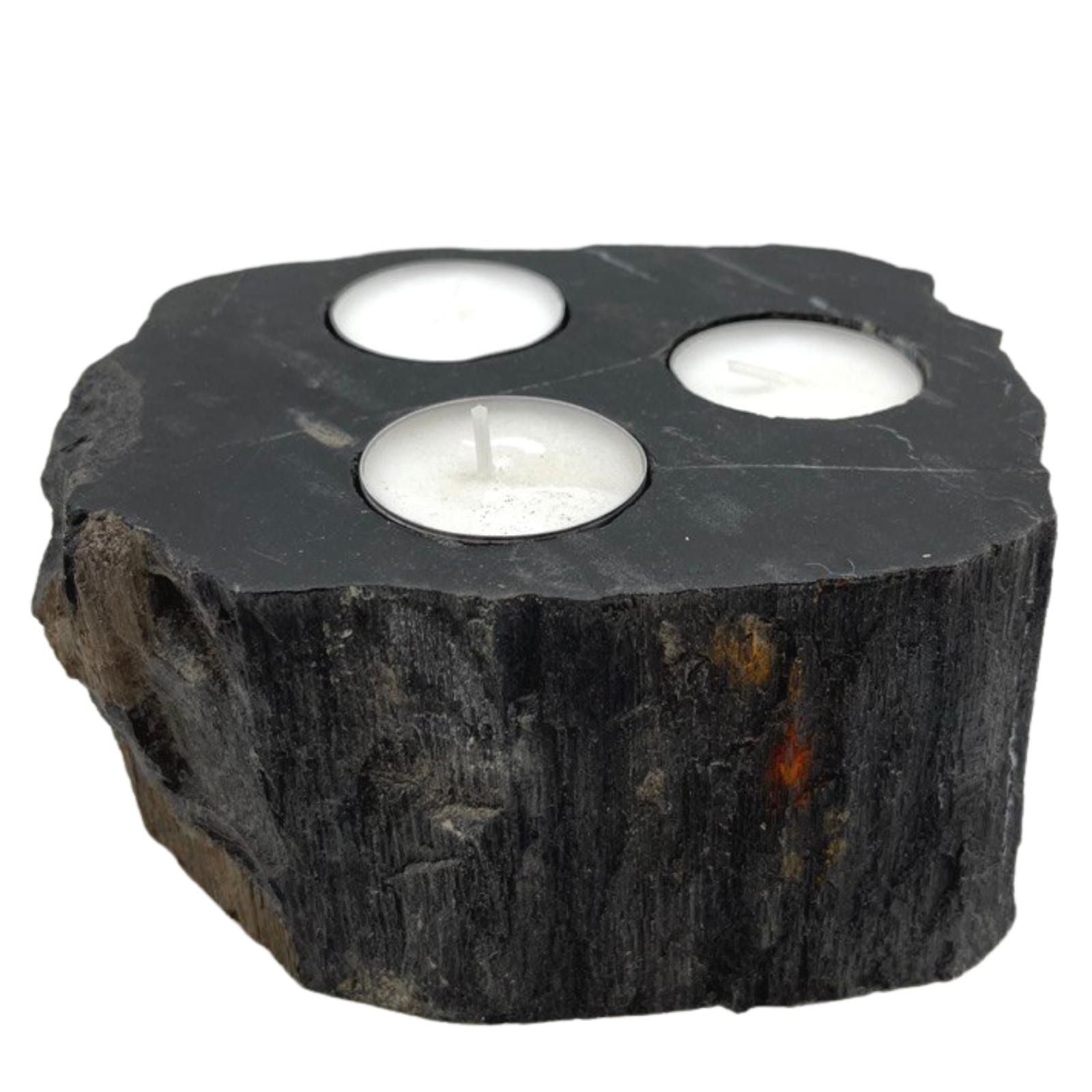 Petrified Wood Candle Holder – Triple 15 CM, dark petrified wood tealight holder with three white tealight candles on top