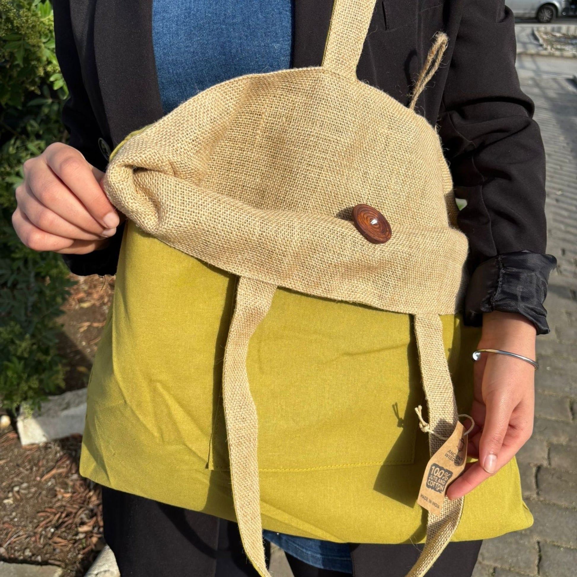 Pistachio Reversible Jute & Cotton Bag – 49x40 CM in pistachio green with jute flap, button detail and shoulder straps