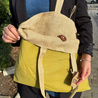 Pistachio Reversible Jute & Cotton Bag – 49x40 CM in pistachio green with jute flap, button detail and shoulder straps