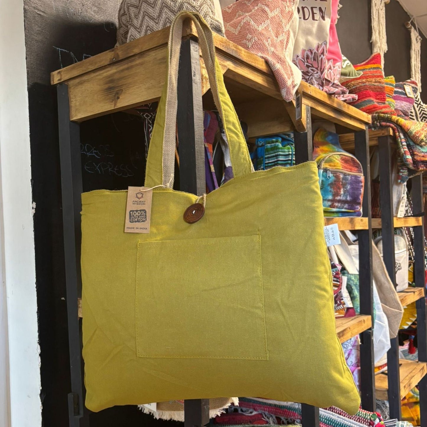 Alt Tag: Pistachio Reversible Jute & Cotton Bag – 49x40 CM in pistachio green, roomy tote with sturdy handles and front pocket