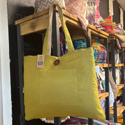 Alt Tag: Pistachio Reversible Jute & Cotton Bag – 49x40 CM in pistachio green, roomy tote with sturdy handles and front pocket