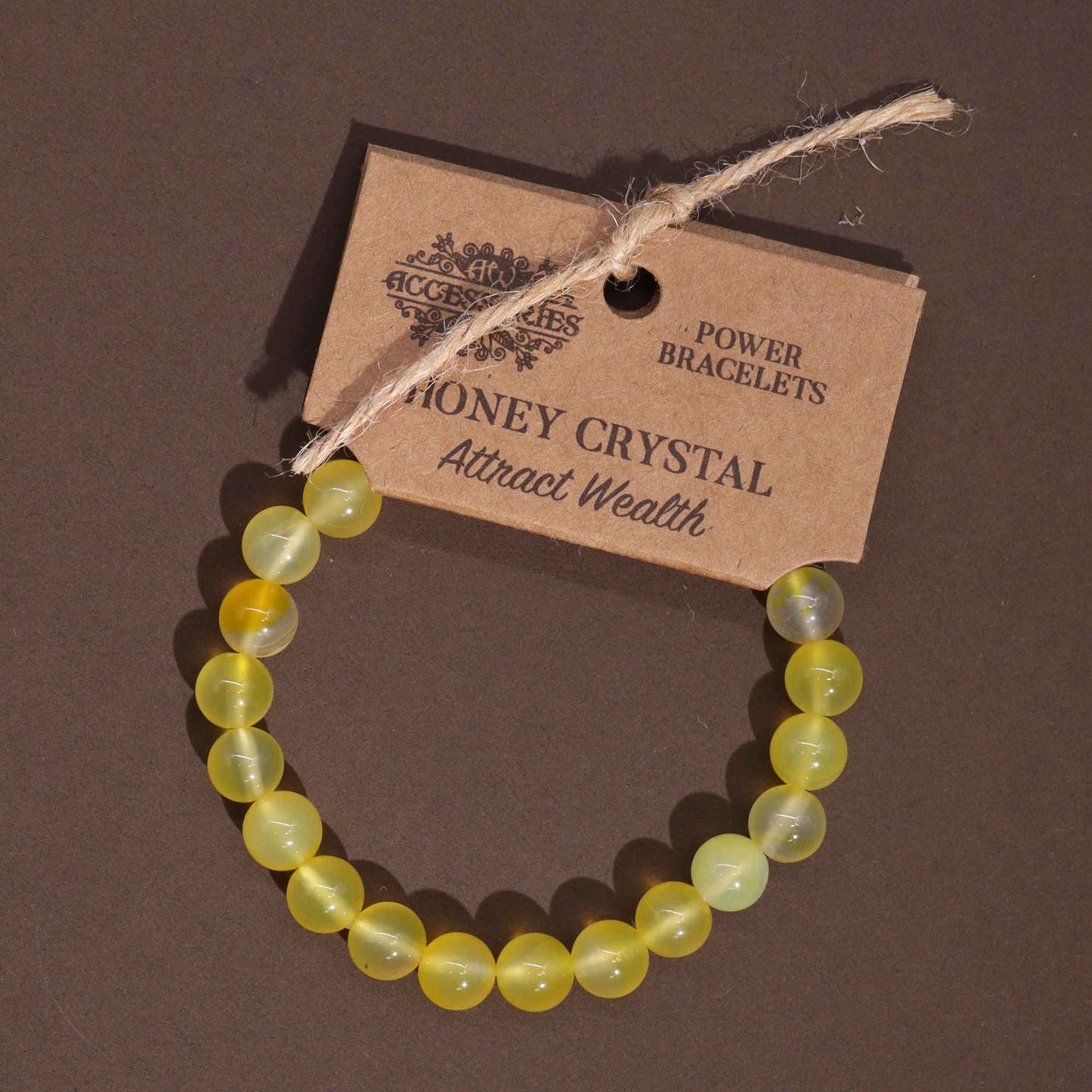 Alt Tag: Power Bracelet – Honey Crystal pulsera de cuentas amarillas de cristal miel natural con etiqueta de producto, hecha a mano