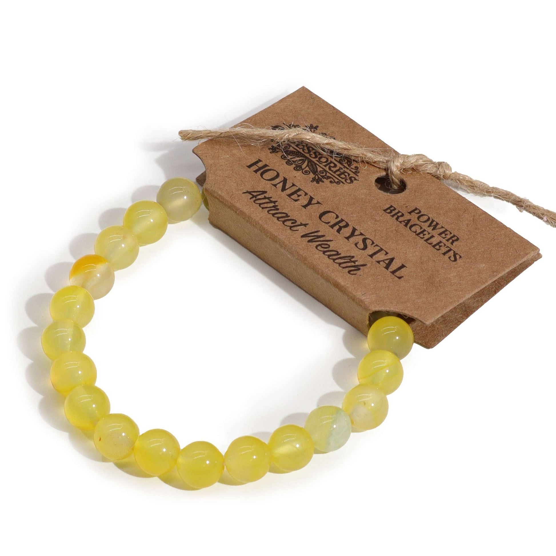 Alt Tag: Power Bracelet – Honey Crystal pulsera de cuentas de cristal miel amarillo con etiqueta kraft, joyería artesanal de piedras naturales