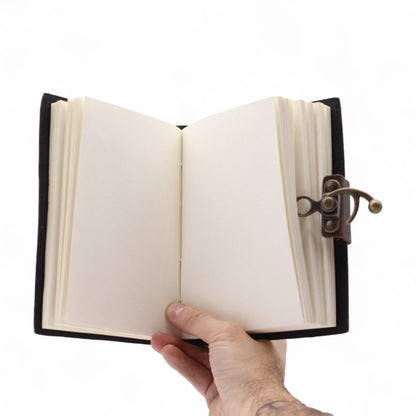 Printed Leather Notebook – 17.8 × 12.7 CM Never Give Up On Your Dreams open notebook with blank pages and clasp closure