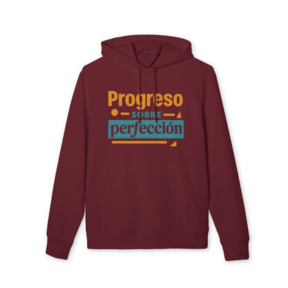 Alt Tag: Progreso Sobre Perfeccion 100% Organic Cotton Hoodie burdeos con capucha, texto “Progreso sobre perfección” en el pecho