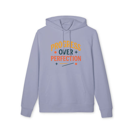 Alt Tag: Progress Over Perfection Premium Unisex Hoodie in light blue with "Progress Over Perfection" graphic print and drawstring hood