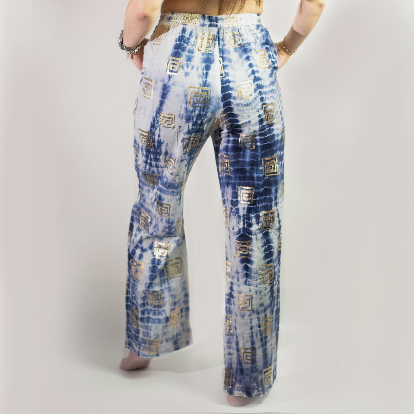 Pure Cotton Lounge Pants – Gold & Blue Greek Motif, back view of blue-and-gold patterned cotton lounge pants on model