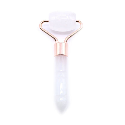 Quartz Gemstone Face Roller – Compact 9 CM, rock quartz facial massage roller with rose gold handle on white background