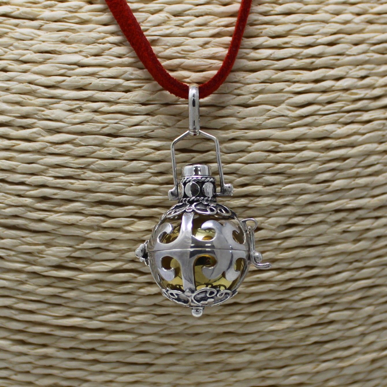 Alt Tag: Radiant Silver Angel Bell – Magic 18MM 925 silver angel bell pendant necklace on red cord, handcrafted Bali, 18mm