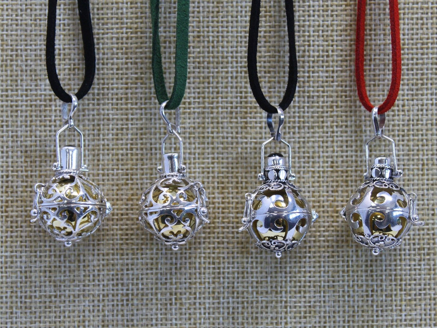 Alt Tag: Radiant Silver Angel Bell – Magic 18MM silver 925 angel bell pendants with filigree design on colored cords