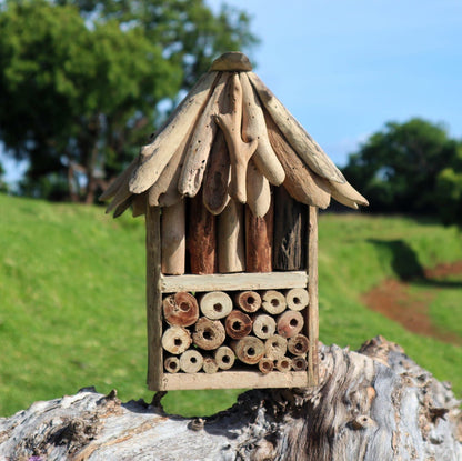 Alt Tag: Recycled Driftwood Bee & Insect Box – Double double nesting box made from recycled driftwood with drilled log tubes, garden habitat