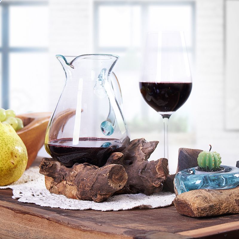 Recycled Glass Water Jug – 18x10 CM Artisan Blend with Balinese Gamal wood root base, handcrafted pitcher on rustic table