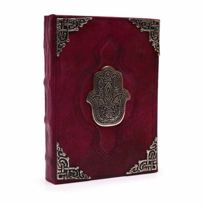 Alt Tag: Red Tan Leather Journal – Zinc Hamsa 26x18CM, red-tan leather notebook with zinc Hamsa emblem and ornate metal corner protectors