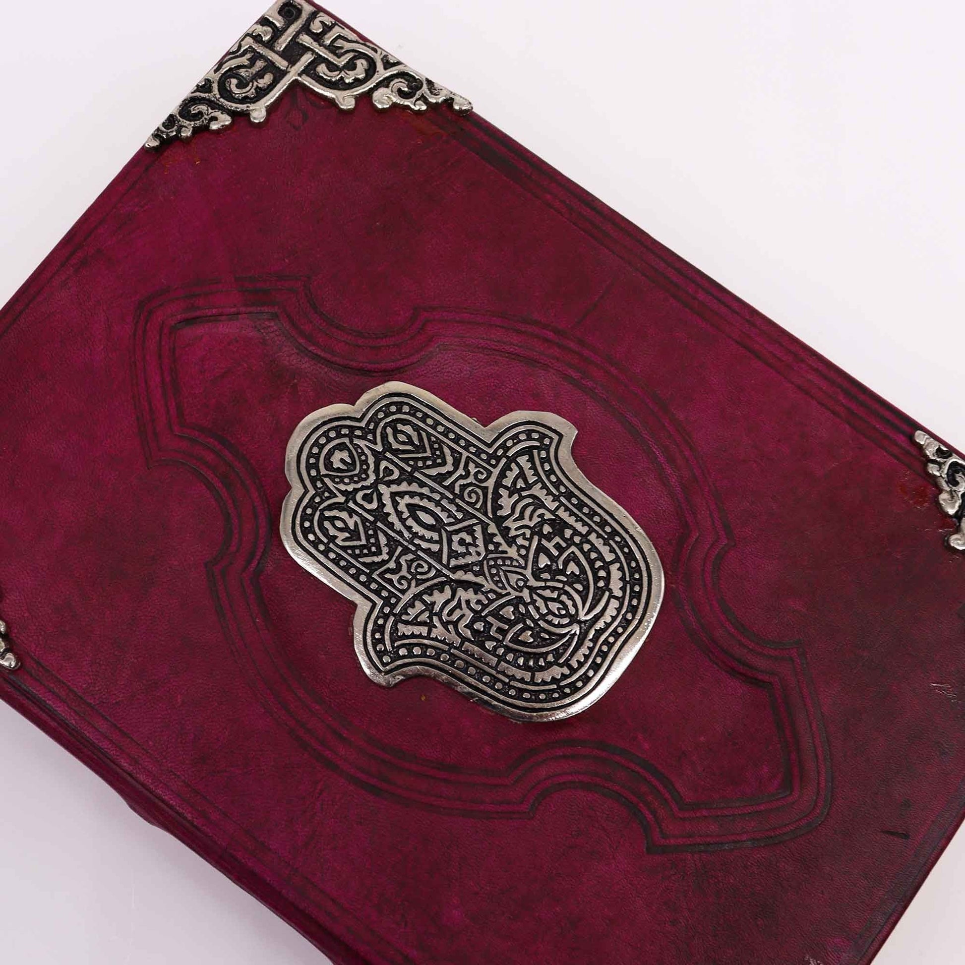 Alt Tag: Red Tan Leather Journal – Zinc Hamsa 26x18CM with embossed red-tan leather cover, zinc Hamsa emblem and ornate metal corner details