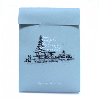 Red Temple String Bracelet – Endless Knot packaging, grey pouch with temple illustration and “Temple String Bracelet” text