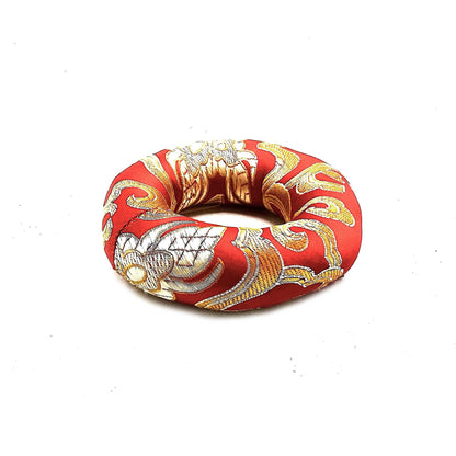 Alt Tag: Red Textile Singing Bowl Cushion – 8CM red polyester textile cushion ring with gold floral pattern for 10-12CM singing bowls