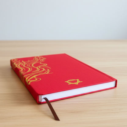 Alt Tag: Red Wellness Journal – 120 Pages – Golden Mandala & Lotus red hardcover journal with gold mandala design and ribbon bookmark on desk