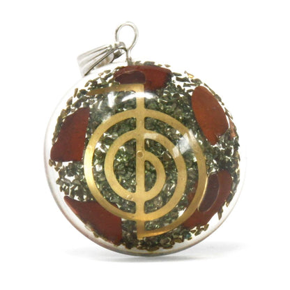 Resin Orgonite Pendant – Symbolic Power Dome red gemstone chips with gold symbol dome pendant on white background