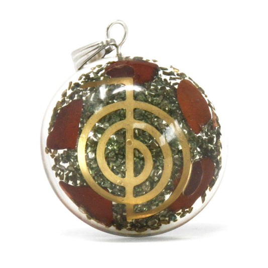Resin Orgonite Pendant – Symbolic Power Dome red gemstone chips with gold symbol dome pendant on white background