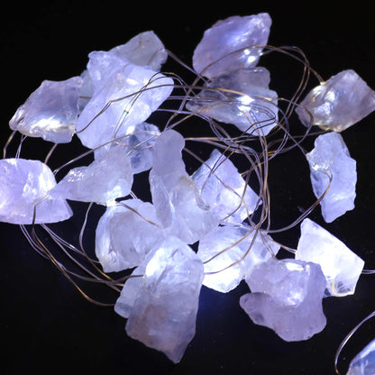 Alt Tag: Rock Quartz Gemstone Enchantment Lights – Decorative String with glowing clear crystal quartz stones on warm white fairy wire
