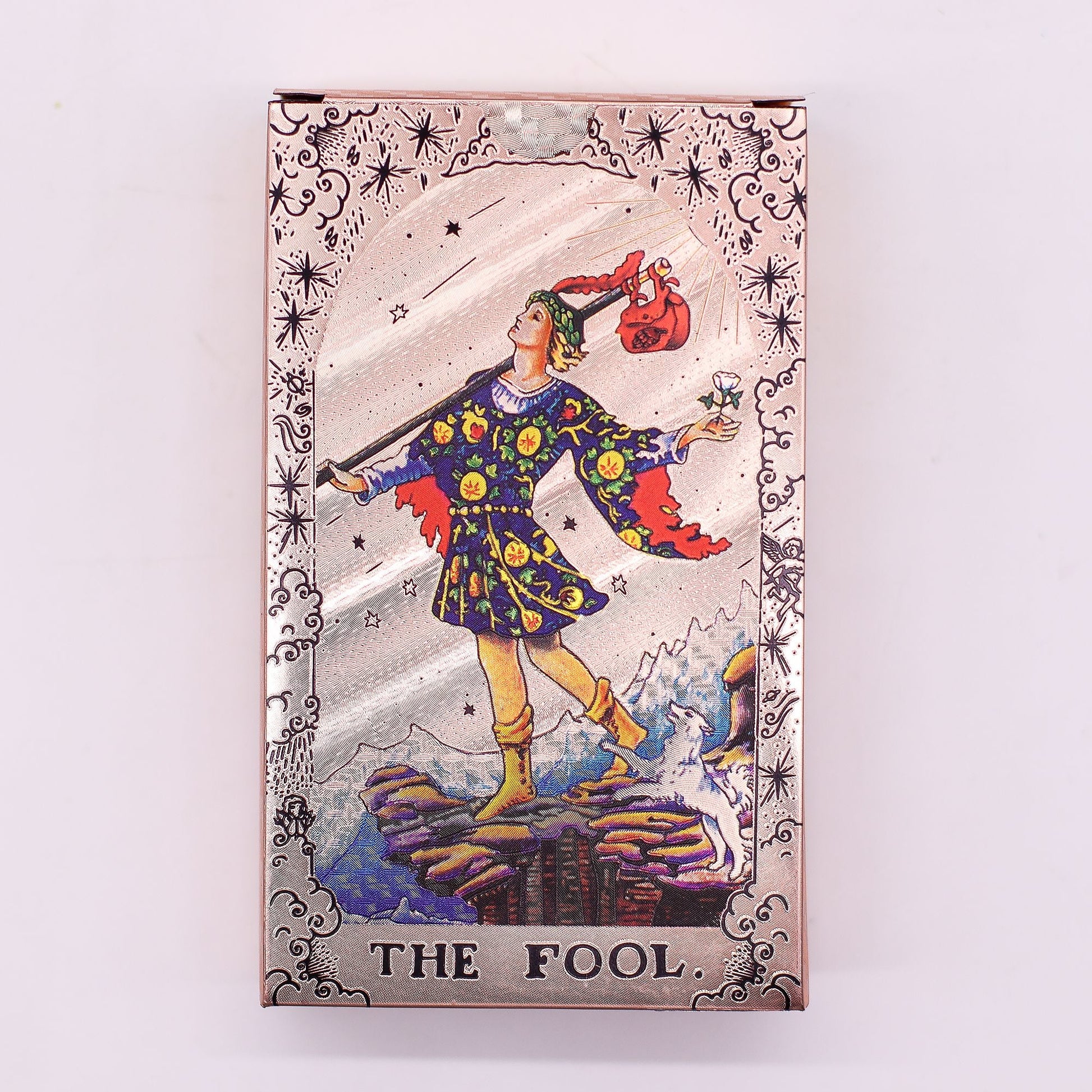 Alt Tag: Rose Gold Foil Tarot Card Set – Moon Phase The Fool tarot card with rose gold foil border and celestial star details