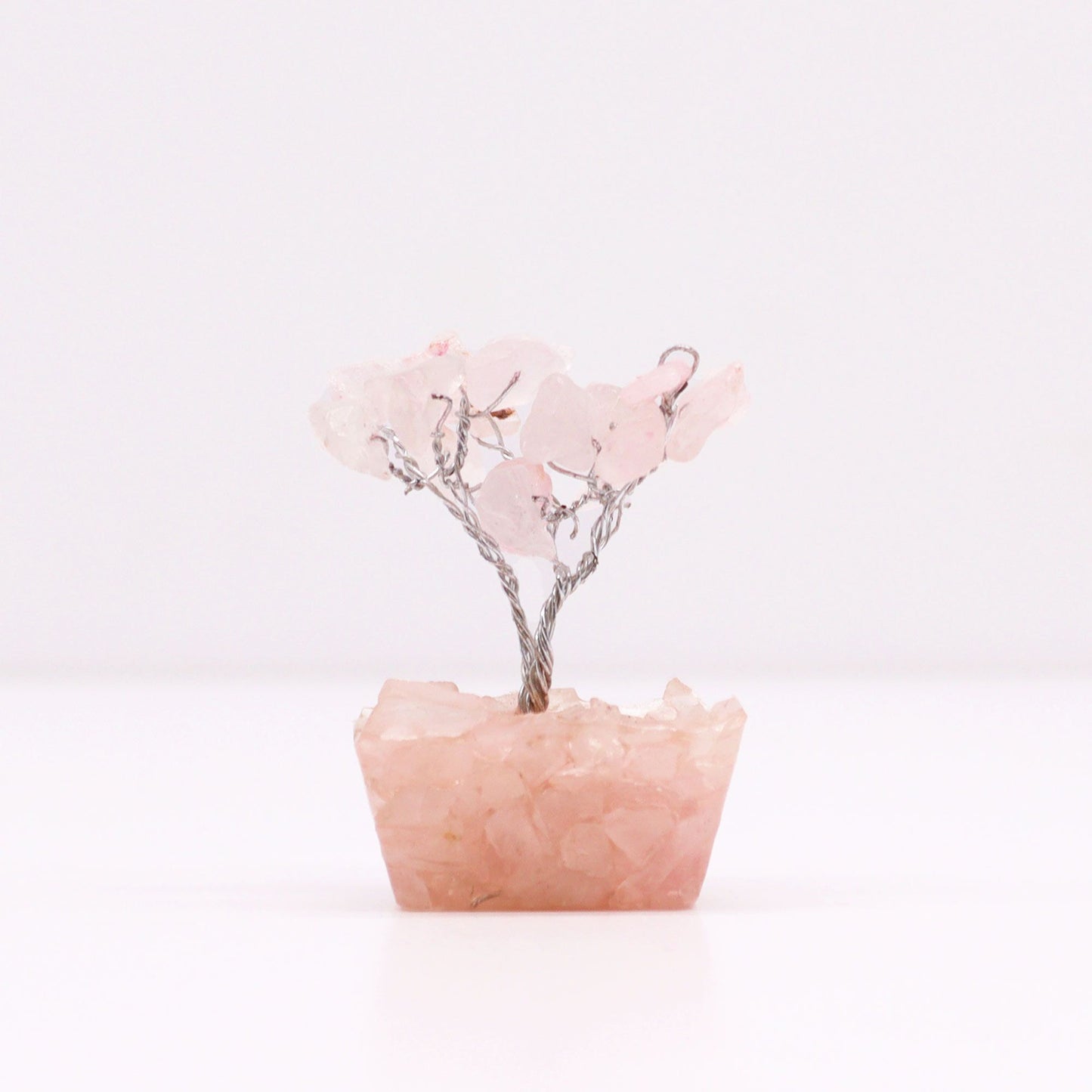 Alt Tag: Rose Quartz Gemstone Tree – Mini, 5CM Height with pink chipstone leaves and wire branches on rose quartz crystal base