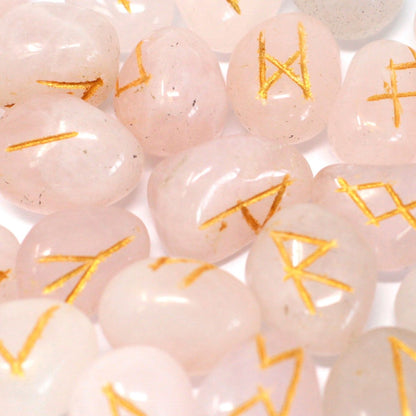 Alt Tag: Rose Quartz Indian Rune Set – 2x2x1.5 CM, close-up of rose quartz rune stones with gold engraved symbols