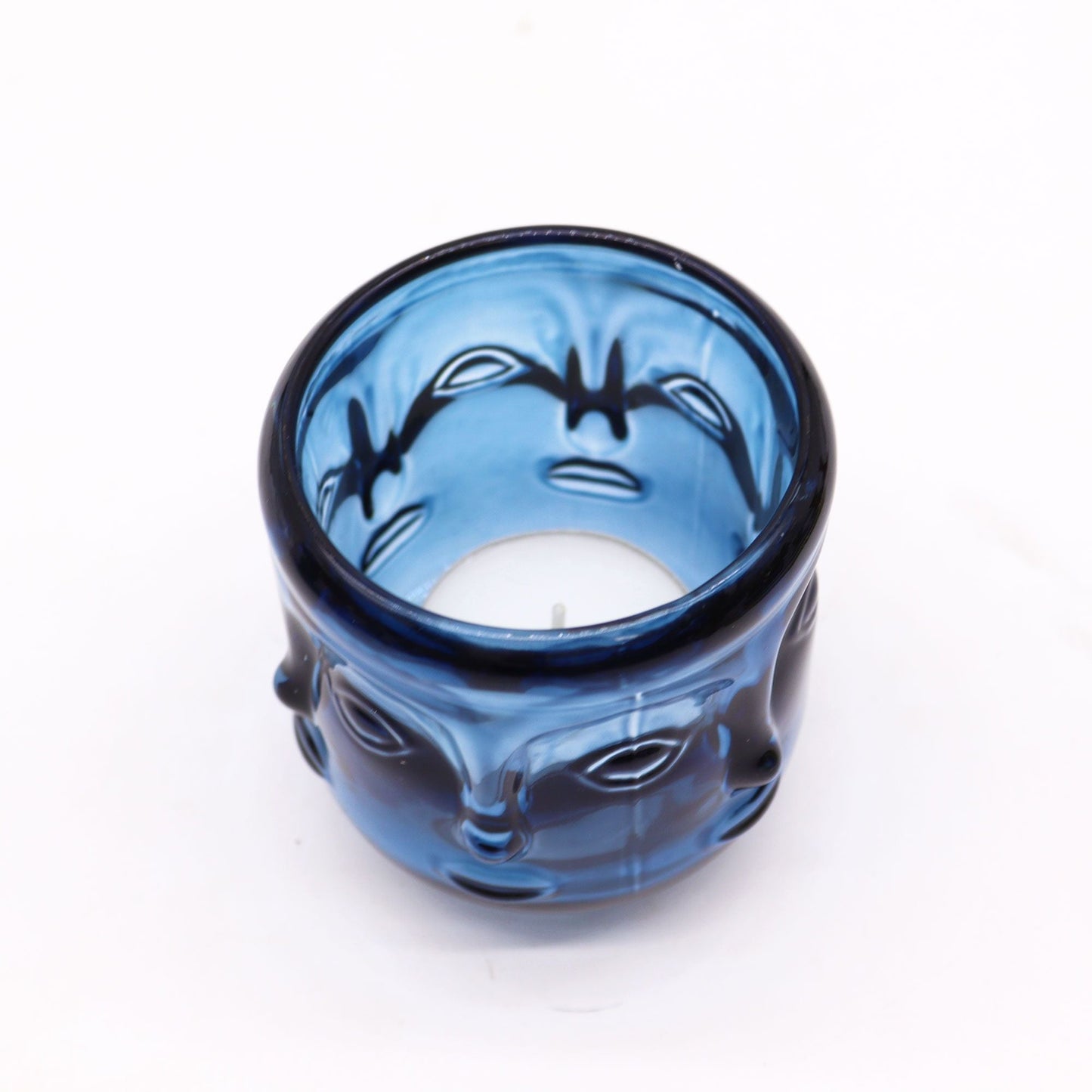 Royal Blue Buddha Faces Candle Jars – Set of 2 pressed glass candle jar with Buddha face design in royal blue, top view