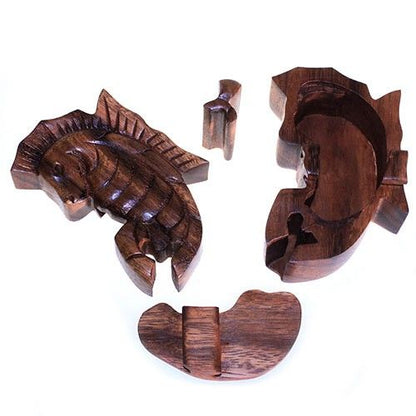 Alt Tag: Saman Wood Bali Magic Box – Sea Horse puzzle box in carved Saman wood, seahorse design with removable pieces, 8x2 cm