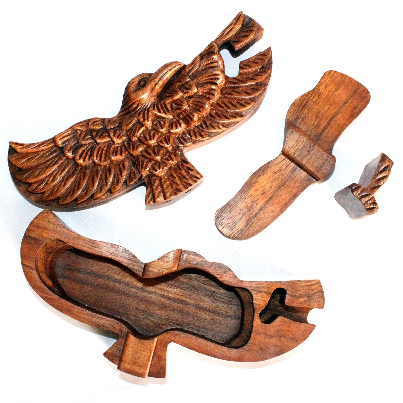Saman Wood Magic Box Puzzle – 13.5x2.5 CM wooden eagle-shaped magic box puzzle, disassembled pieces showing carved detail