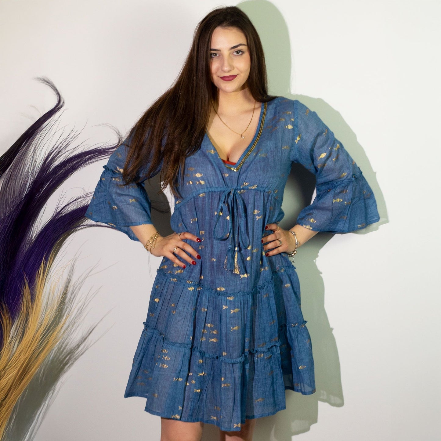 Alt Tag: Sea Blue & Gold Fish Nomad Sari Dress – ML worn by model, sea-blue tiered dress with gold fish motifs and bell sleeves
