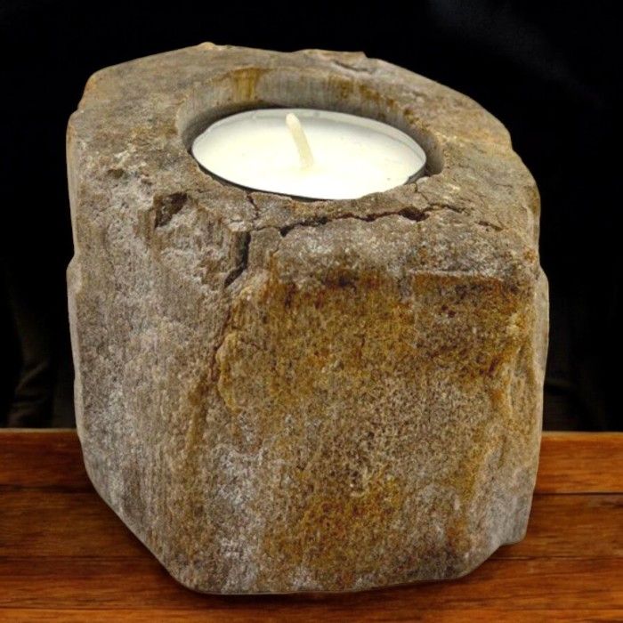 Single Low Petrified Wood Candle Holder – Natural Stone, low-profile petrified wood tealight holder with candle on wooden surface