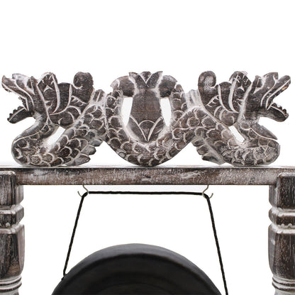 Alt Tag: Small Harmonizing Gong in Stand – 25 CM – Black, detail of carved wooden stand with decorative motif and hanging black gong