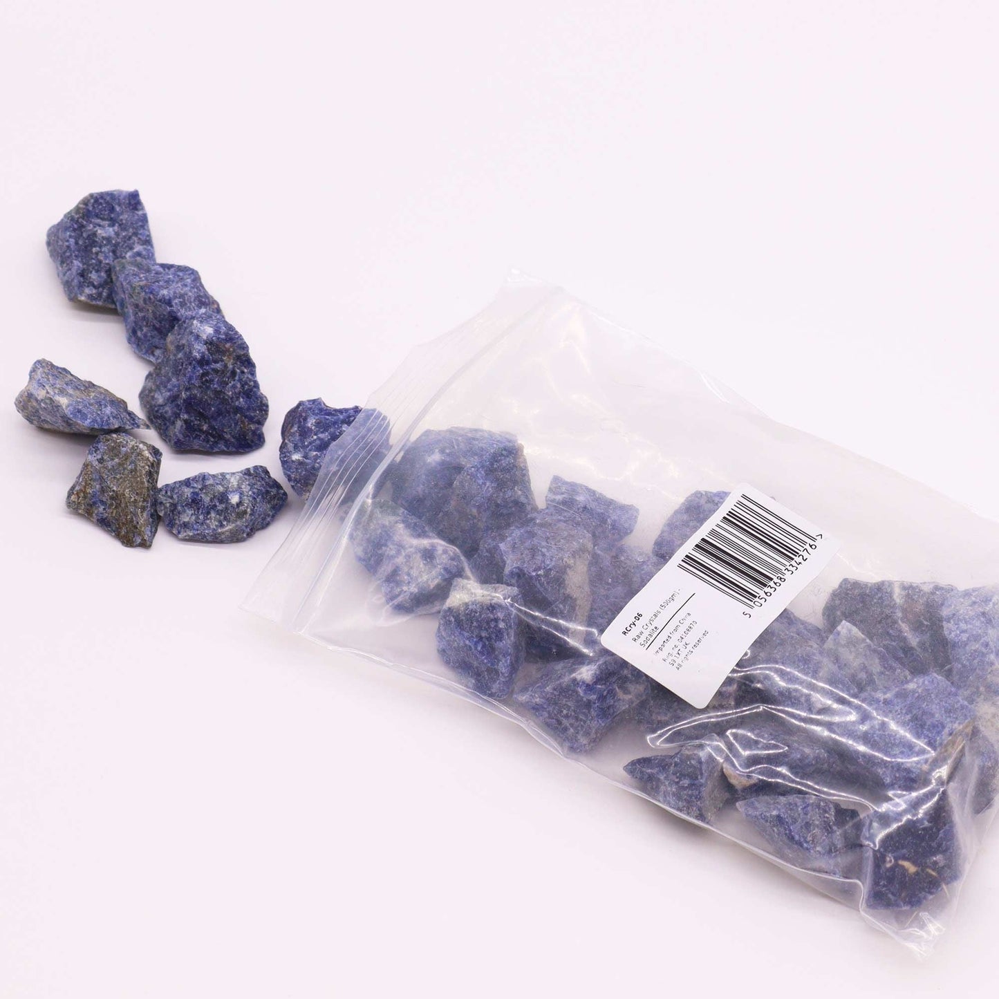 Alt Tag: Sodalite Gemstone Crystals – 500G raw blue rough stones with white marbling, 500g pack in clear bag