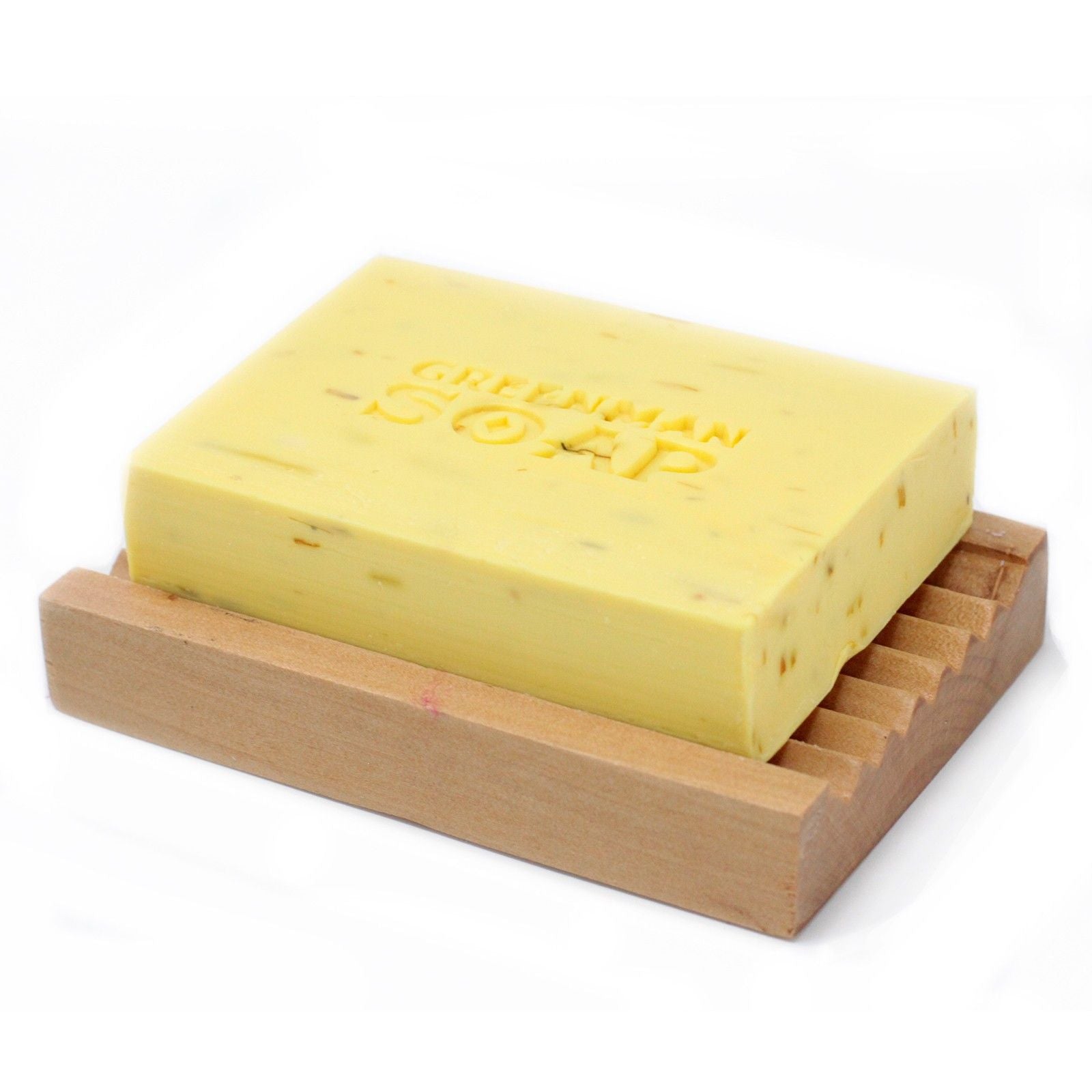 Alt Tag: Sodium Palmate Greenman Soap – 100G Gentle & Kind yellow bar soap on wooden dish, Greenman Soap logo embossed