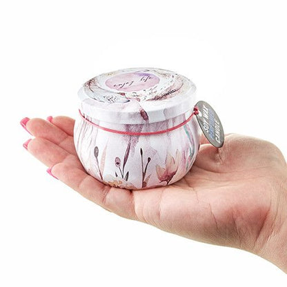 Alt Tag: Soy Wax Art Tin Candle – Friendly Messages decorative floral tin candle held in hand, compact 6.5x6.5x5 cm soy wax candle