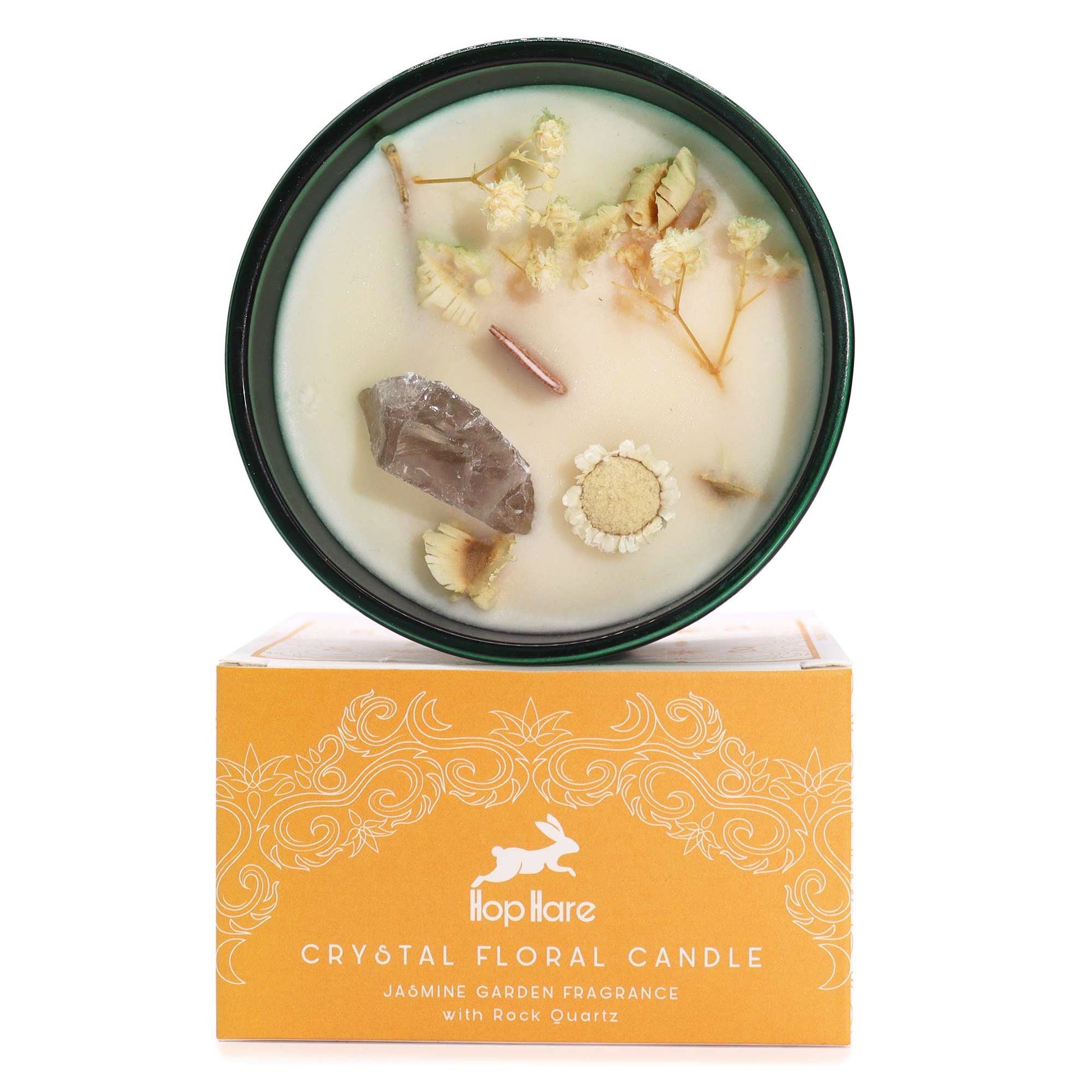 Vela de cera de soja – Jazmín y Cuarzo Cristal de Roca en vaso de vidrio verde con mecha de madera, cera con cuarzo y flores secas sobre caja