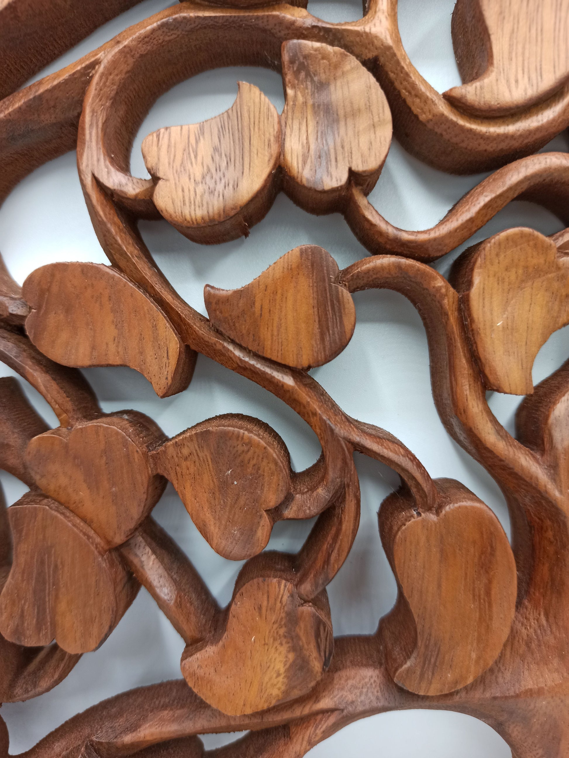 Alt Tag: Close-up of hand-carved Suar wood Tree of Life leaves on wall decor, Suar Wood Tree of Life Wall Panel – 40CM