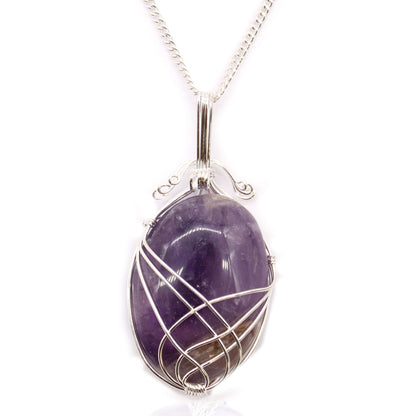 Alt Tag: Swirl Wrapped Gemstone Necklace - Amethyst pendant with genuine purple amethyst cabochon in silver swirl wire wrap on chain
