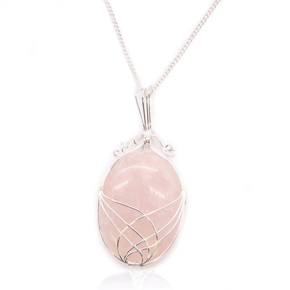Alt Tag: Swirl Wrapped Gemstone Necklace – Rose Quartz pendant with swirl wire-wrapped pink rose quartz gemstone on silver chain